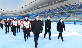 Chinese President Xi Jinping, also general secretary of the Communist Party of China Central Committee and chairman of the Central Military Commission, visits the National Speed Skating Oval in Beijing