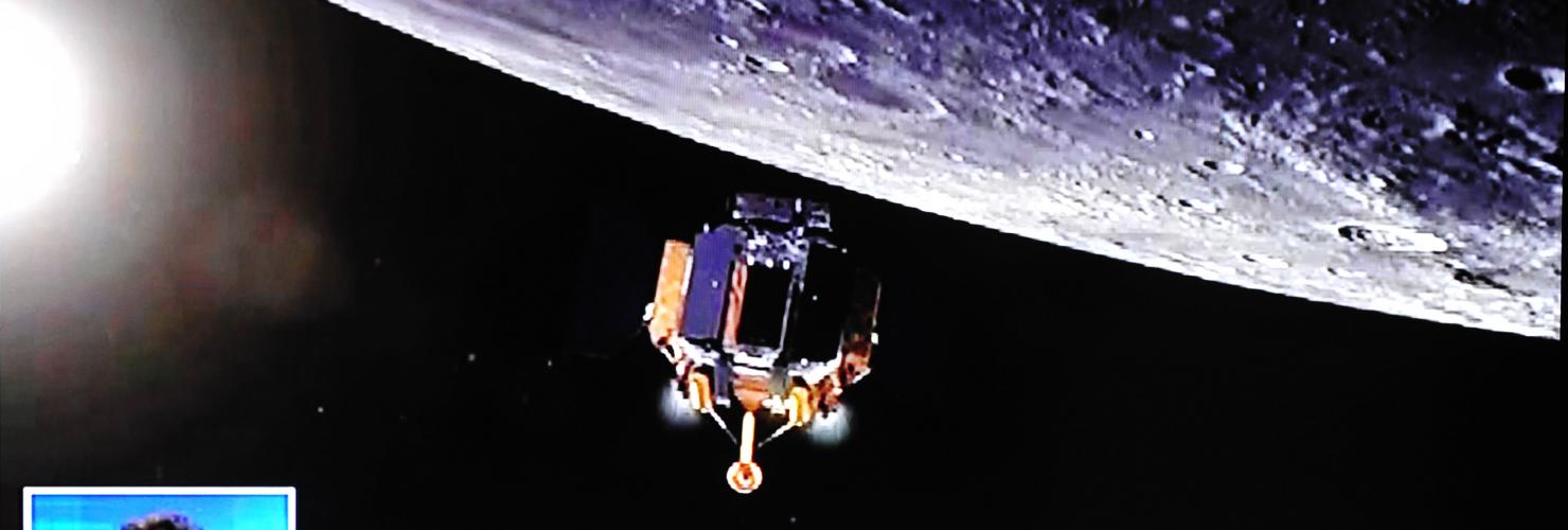TV screen shot of China's robotic lunar probe Chang'e-4 landing on the far side of the moon on January 3, 2019.