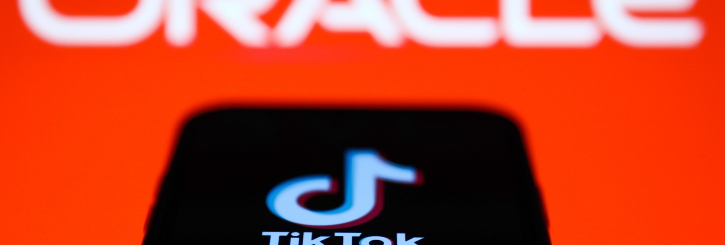Logos of TikTok and Oracle
