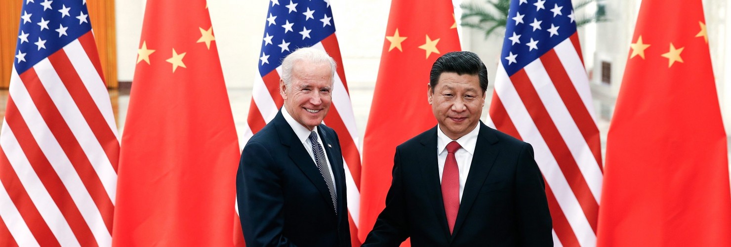 Chinese President Xi Jinping shakes hands with US Vice President Joe Biden inside the Great Hall of the People in Beijing, China, 2013.