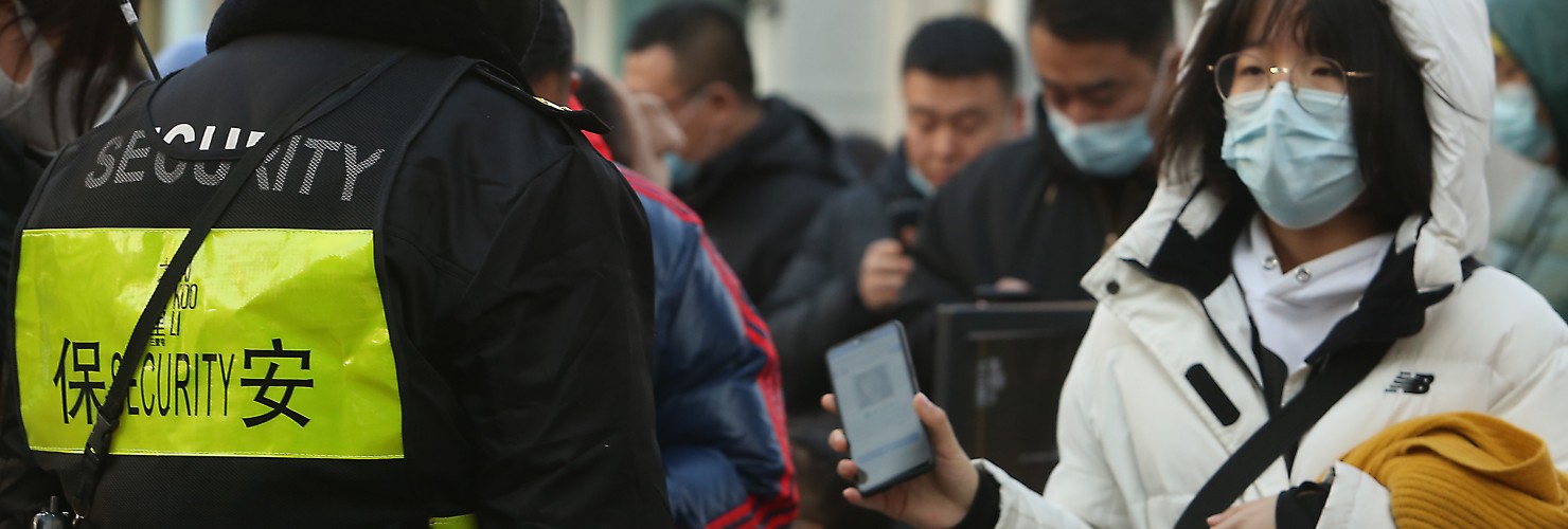 Chinese Show Security Health Status on Smarphone App in Beijing, China