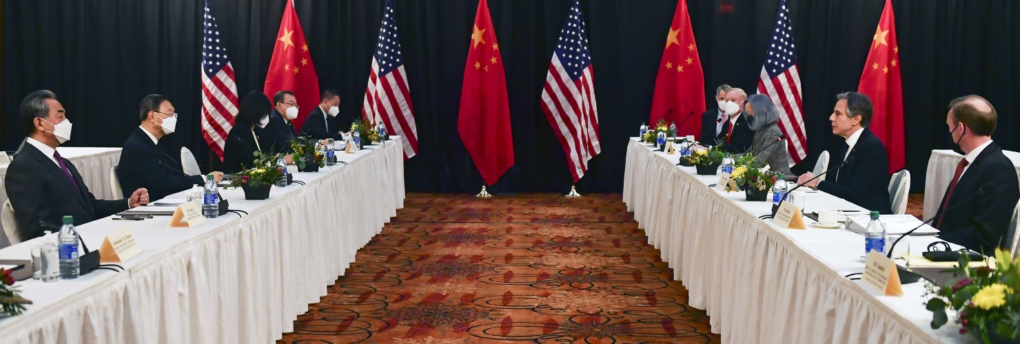 Secretary of State Antony Blinken, second from right, joined by national security adviser Jake Sullivan, right, speaks during the opening session of US-China talks with Chinese Communist Party foreign affairs chief Yang Jiechi, and China's State Councilor Wang Yi, at the Captain Cook Hotel in Anchorage, Alaska.