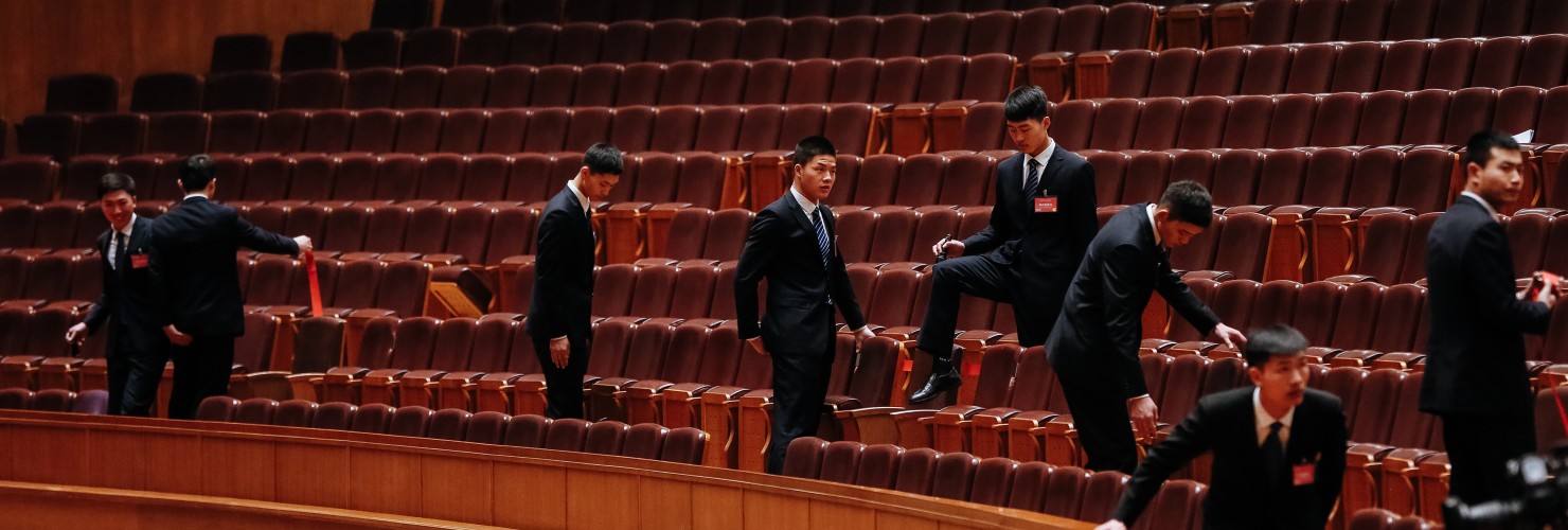Chinese security officers check the hall after the 2nd Plenary Session of the Fifth Session of the 12th National People's Congress (NPC) at the Great Hall of the People in Beijing, China, 08 March 2017.