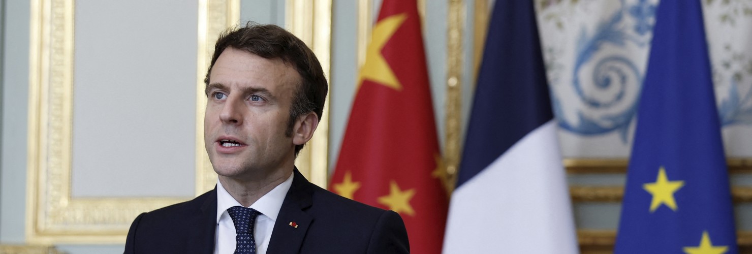 French President Emmanuel Macron attends a video-conference with German Chancellor Olaf Scholz and Chinese President Xi Jinping to discuss the Ukraine crisis at the Elysee Palace in Paris, Tuesday, March 8, 2022. 