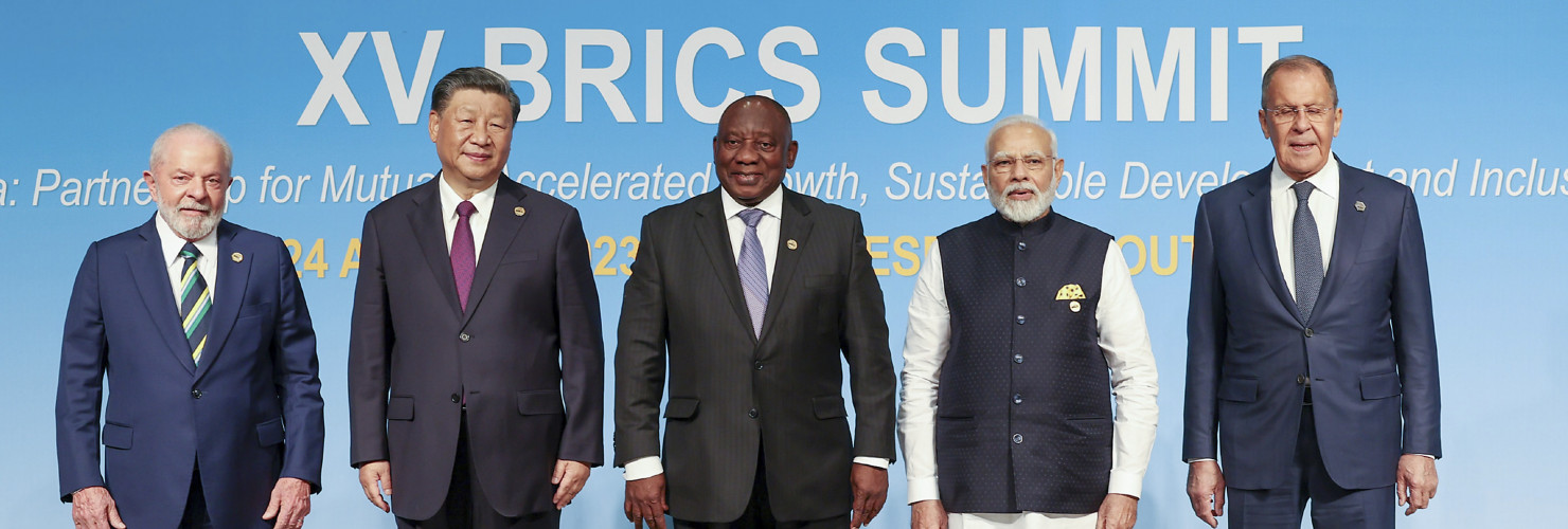 Left to right: Brazilian President Luiz Inacio Lula da Silva, Chinese President Xi Jinping, South African President Cyril Ramaphosa, Indian Prime Minister Narendra Modi and Russian Foreign Minister Sergey Lavrov pose for the group photo at the 15th BRICS Summit, August 23, 2023 in Johannesburg