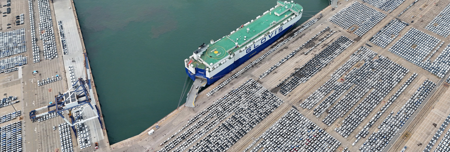 Car carriers load cars for export at Yantai Port in Yantai, Shandong province, China, July 2024.