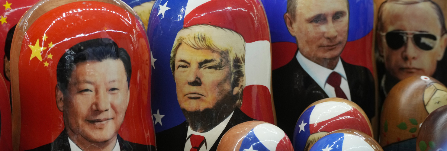 Traditional Russian wooden dolls called Matryoshka depicting China's President Xi Jinping, U.S. President-elect Donald Trump and Russian President Vladimir Putin are displayed for sale at a souvenir shop in St. Petersburg, Russia.