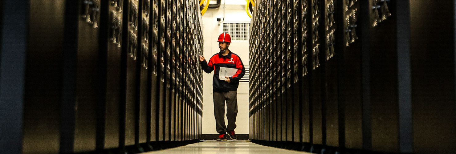  A staff member works in the data room of a supercomputing center in Gui'an New Area, southwest China's Guizhou Province, Aug. 29, 2024.