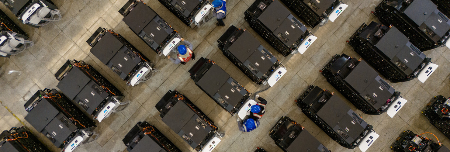 Workers debug smart mobile charging piles at Nantong Guoxuan New Energy Technology Co., LTD., located in Nantong High-tech Zone, East China's Jiangsu provincr