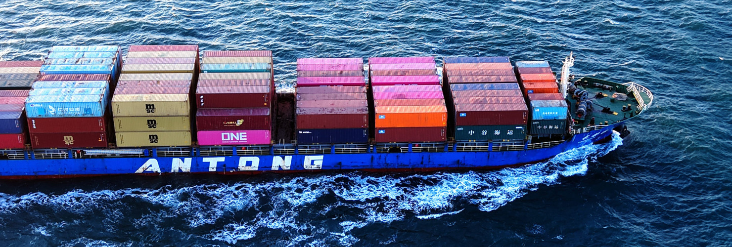 A cargo ship loaded with foreign trade containers sails out of the port of Qingdao in Shandong province, China on March 18, 2025.