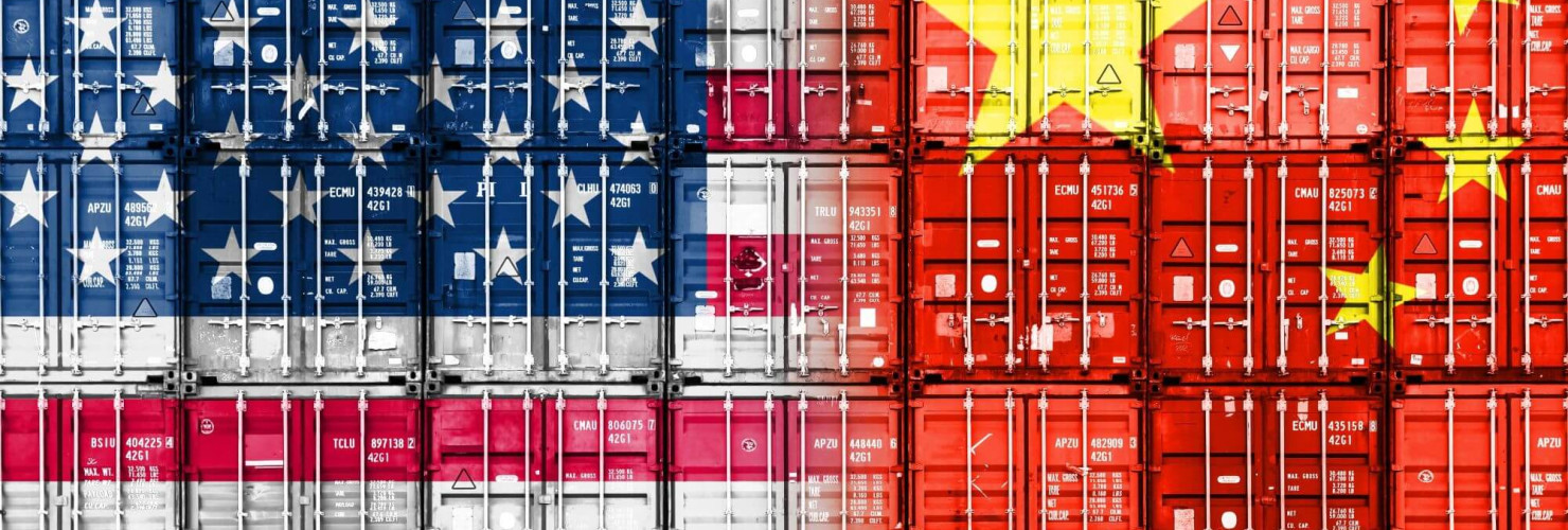 Containers with US and Chinese flags