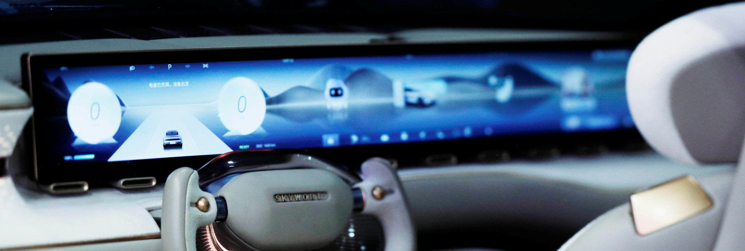 Interior of the SKYWORTH Y with a view of the large flat screen on the dashboard