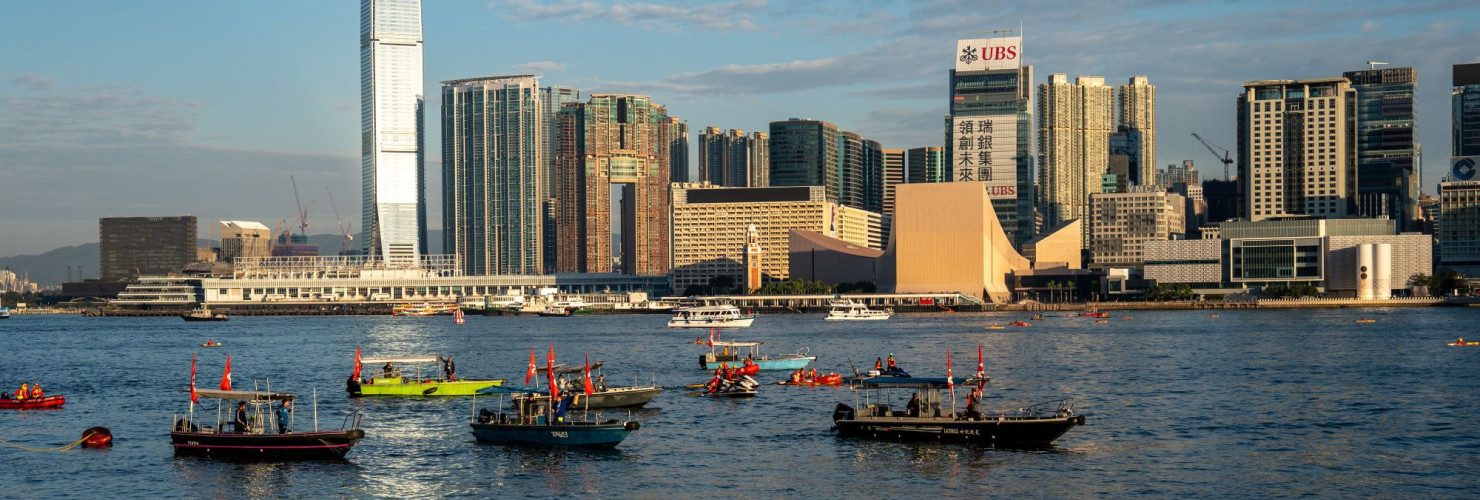Swimmers participate in the Victoria Harbour Race in Victoria Harbor on November 22, 2025 in Hong Kong