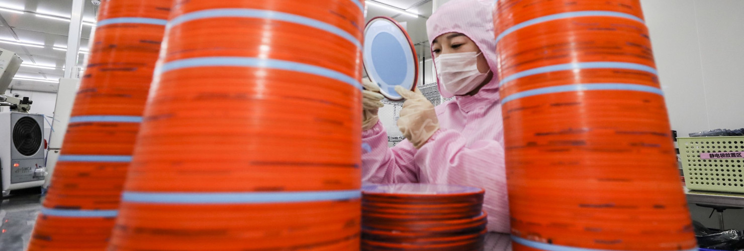 Workers stepped up the production of chips for orders at home and abroad