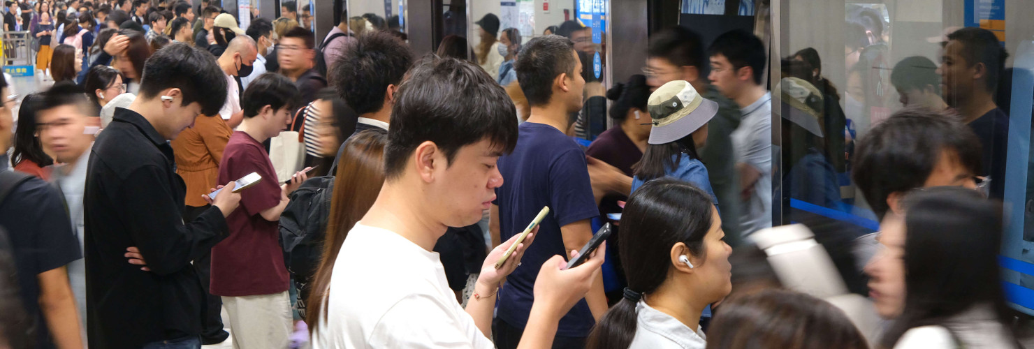 People travel by subway at Zhichun Road Subway Station in Beijing, China on September 17, 2025.
