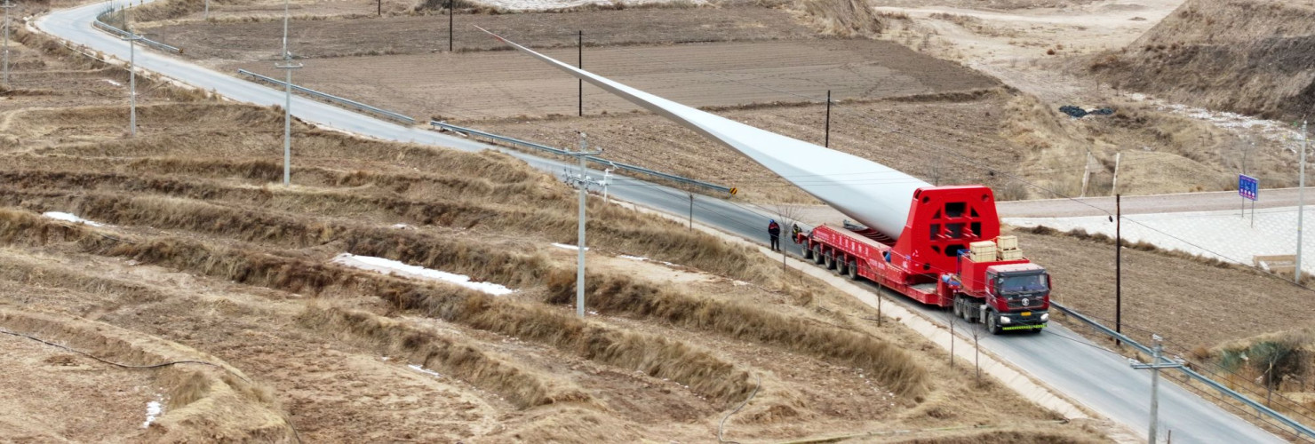 A truck is transporting wind turbine components on the road in Xigai County, Guoyuan City, Ningxia Hui Autonomous Region, China on January 18, 2026.