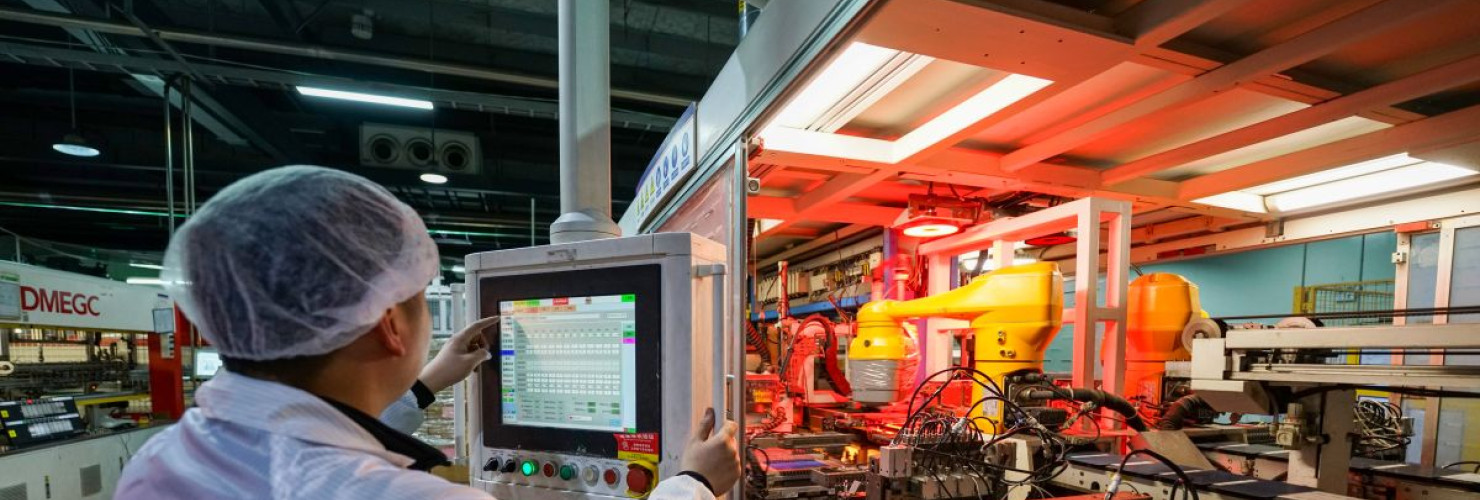 A worker is producing an export order for photovoltaic equipment on a company's production line in Sihong County Economic Development Zone, Suqian City, Jiangsu Province, China on February 24, 2026