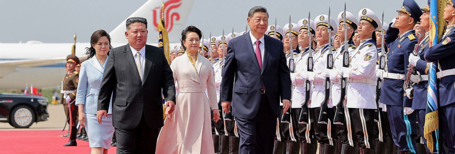 In this photo provided by the North Korean government, North Korean leader Kim Jong Un, front left, and his wife Ri Sol Ju, see off Chinese President Xi Jinping, center right, and his wife Peng Liyuan at the airport in Pyongyang, Tuesday, June 9, 2026. 