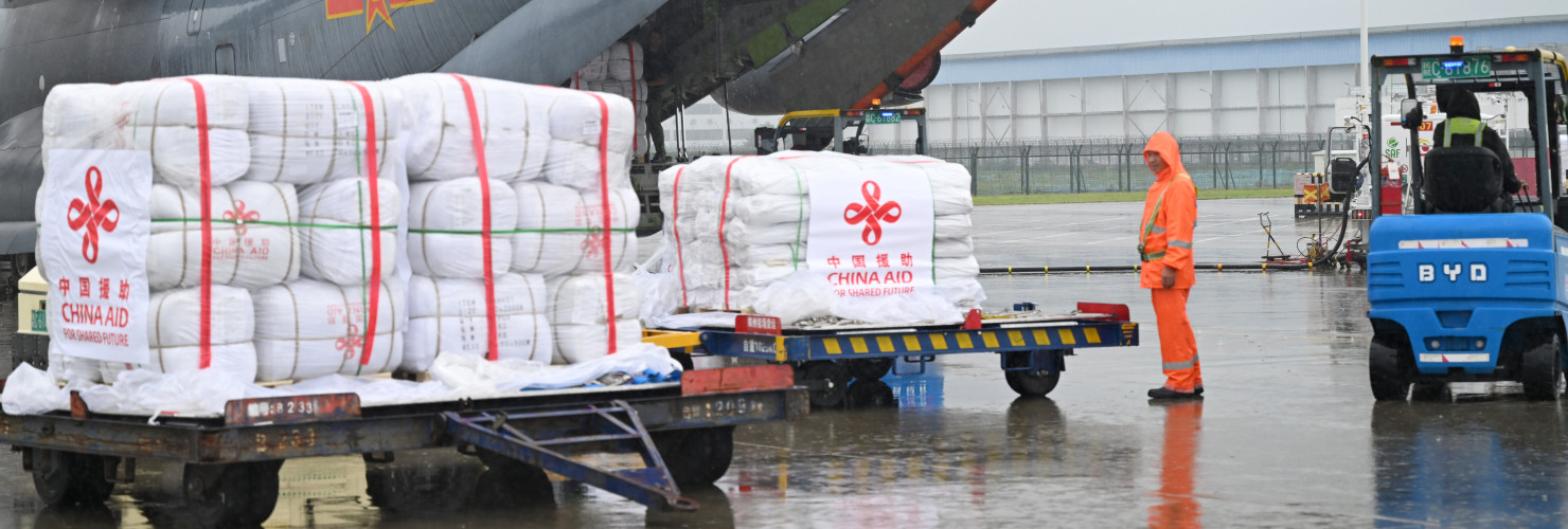 Staff members load flood relief supplies provided by the Chinese government to Pakistan at Zhengzhou Xinzheng International Airport in Zhengzhou, central China's Henan Province, Sept. 27, 2025. 