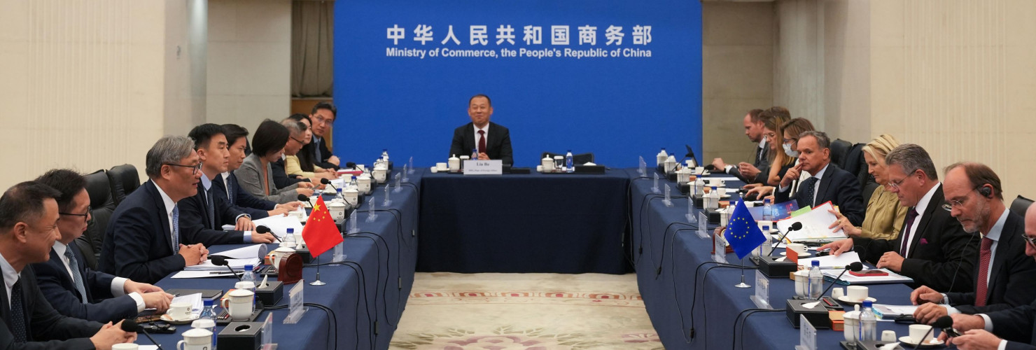 View of Wang Wentao Chinese Minister of Commerce sitting at the head of a large meeting table with Maros Sefcovic European Commissioner for Trade and Economic Security and Interinstitutional Relations on the right side during a meeting at the Ministry of Commerce in Beijing China on 8 October 2026.