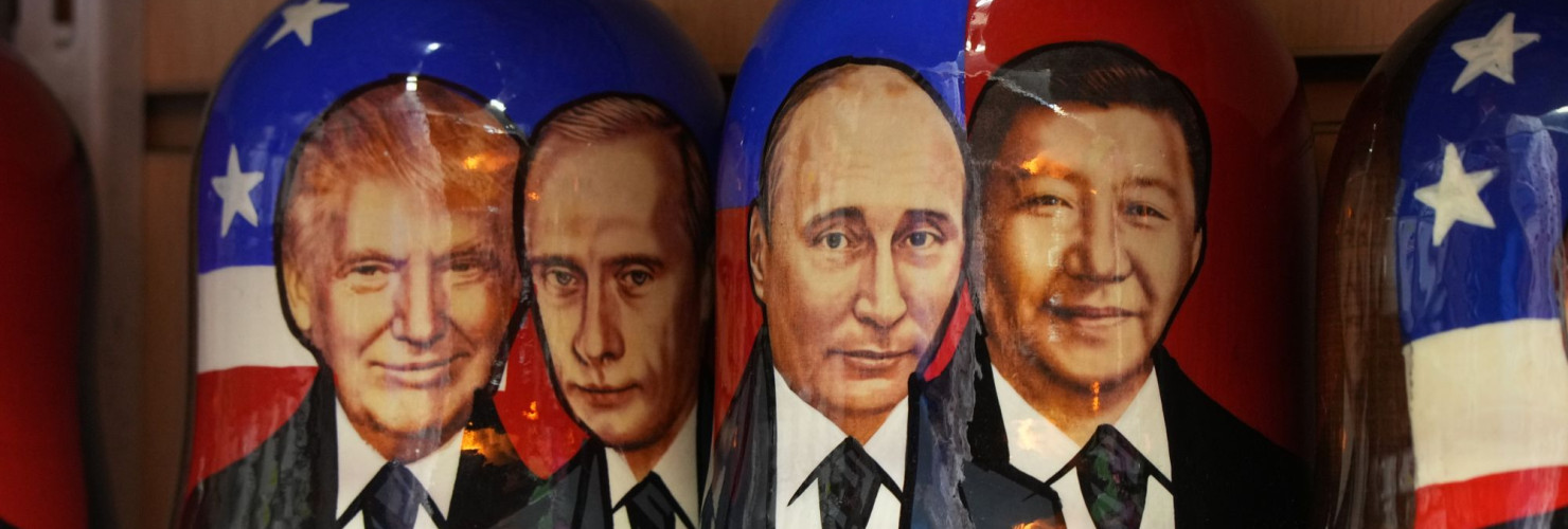 Matryoshkas, the traditional Russian wooden dolls, with images of U.S. President Donald Trump, Russian President Vladimir Putin and China's President Xi Jinping 