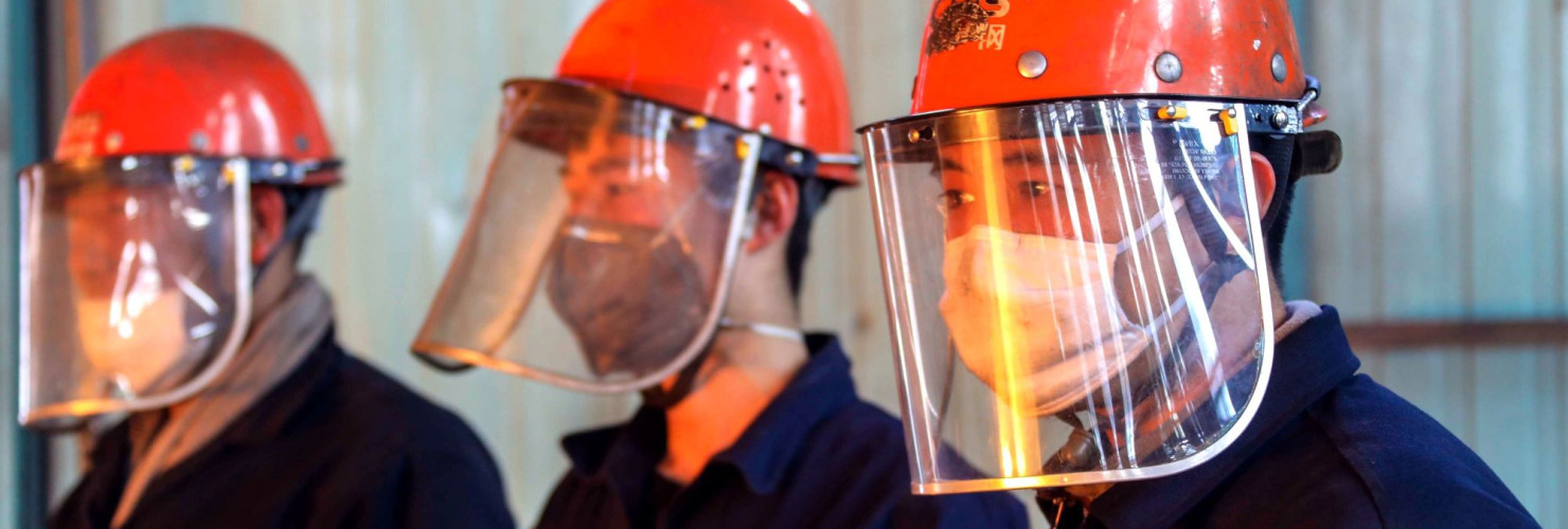 Chinese workers survey the production of steel at a plant of Qingdao Special Iron and Steel Co., Ltd. in Qingdao city.