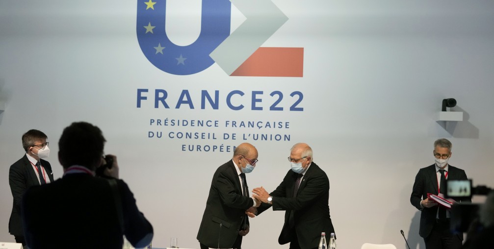 European Union foreign policy chief Josep Borrell, center right, greets French Foreign Minister Jean-Yves Le Drian prior to a meeting of European Union foreign ministers in Brest, France, Friday, Jan. 14, 2022.