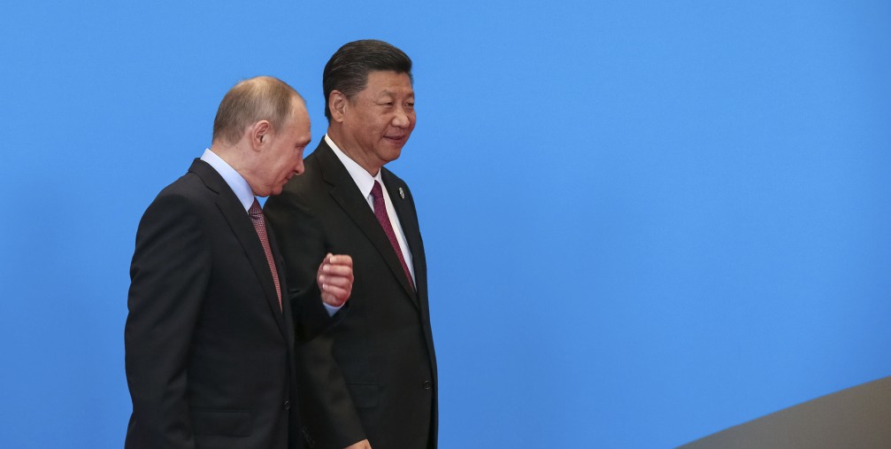 Chinese President Xi Jinping (R) walks with Russian President Vladimir Putin (L) during the welcome ceremony at Yanqi Lake during the Belt and Road Forum, in Beijing, China, 15 May 2017. The Belt and Road Forum runs from 14 to 15 May, which is expected to lay the groundwork for Beijing-led infrastructure initiatives aimed at connecting China with Europe, Africa and Asia.