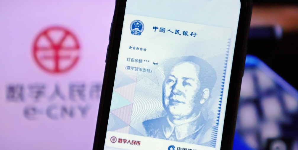 A mobile phone displays a E-CNY currency interface in Yichang, Hubei Province, Feb 9, 2022.