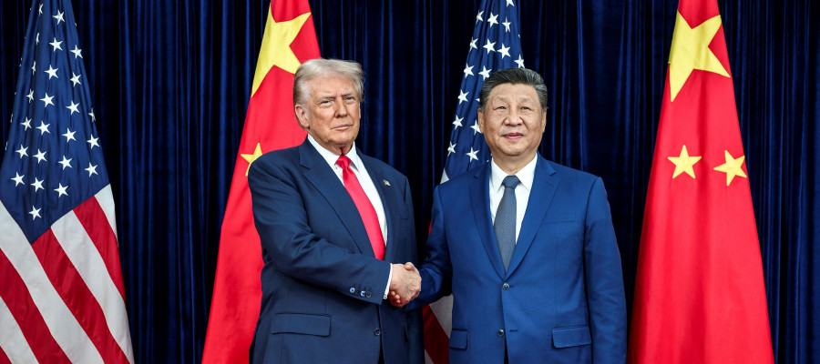 U.S. President Donald Trump, left, greets Chinese President Xi Jinping, right, before a bilateral meeting at Gimhae Air Base, October 30, 2025, in Busan, South Korea.