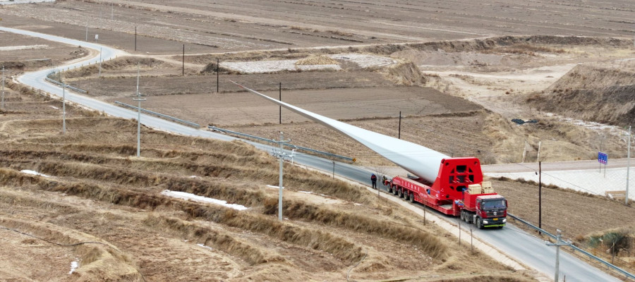 A truck is transporting wind turbine components on the road in Xigai County, Guoyuan City, Ningxia Hui Autonomous Region, China on January 18, 2026.