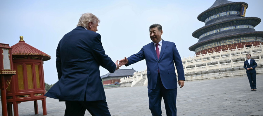 China's President Xi Jinping, right, and U.S. President Donald Trump shake hands at the Temple of Heaven in Beijing Thursday, May 14, 2026.
