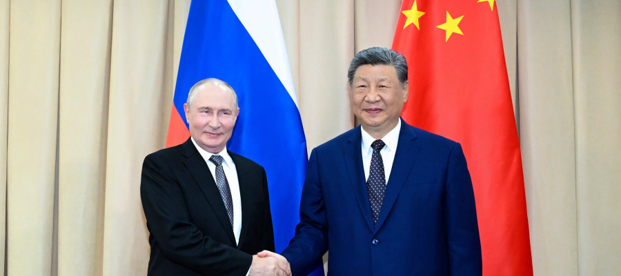 In this photo released by Xinhua News Agency, Chinese President Xi Jinping, right, meets with Russian President Vladimir Putin on the sidelines of the Shanghai Cooperation Organization Summit 2026 in Bishkek, Kyrgyzstan, Monday, Aug. 31, 2026. 