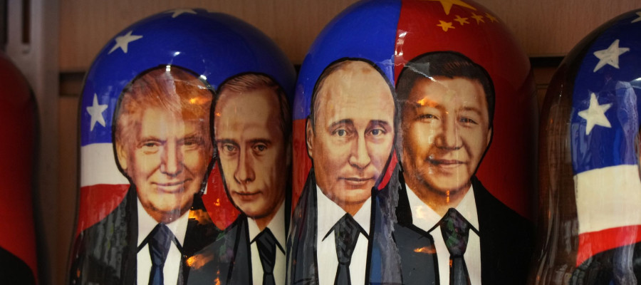 Matryoshkas, the traditional Russian wooden dolls, with images of U.S. President Donald Trump, Russian President Vladimir Putin and China's President Xi Jinping 
