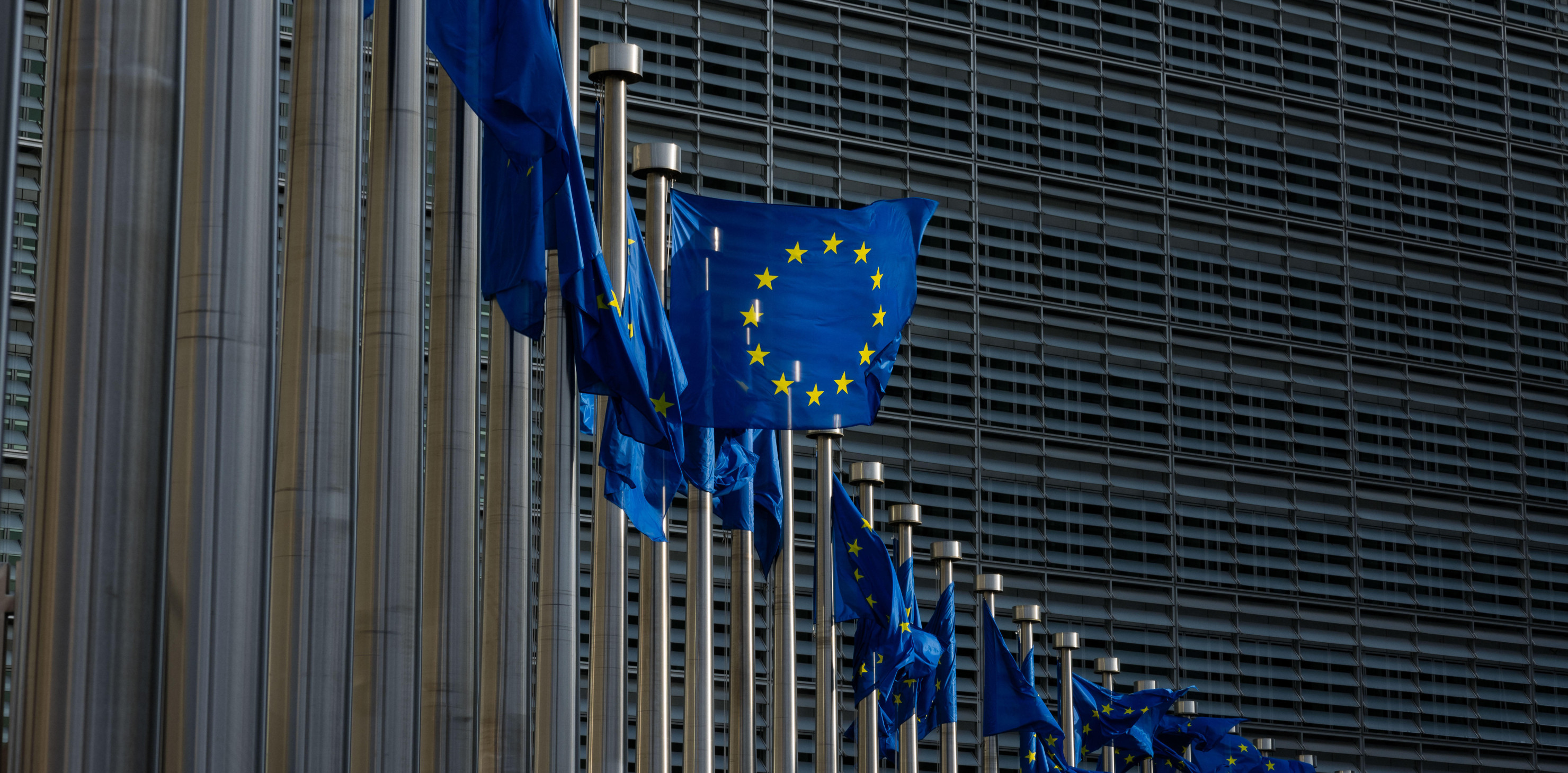 European flags in front of the European Commission headquarters in Brussels.