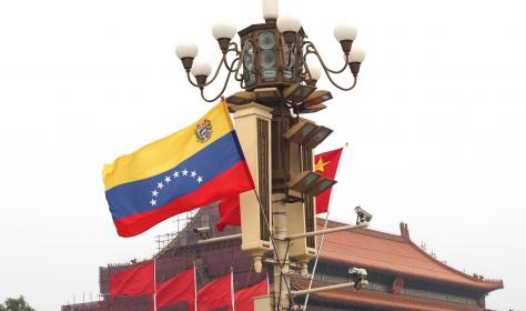 Chinese and Venezuelan flags during Nicolás Maduro's visit to China in September 2018. His challenger in the recent crisis in Venezuela, John Guaido, is also wooing China. 