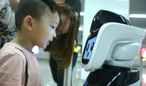 Chinese boy and robot