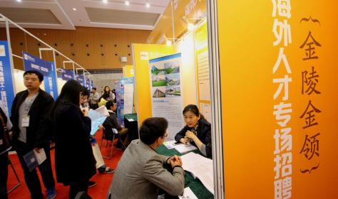 Chinese overseas students at a job fair for returnees in Nanjing, Jiangsu. The government uses monetary and other incentives to woe them to return to China. 