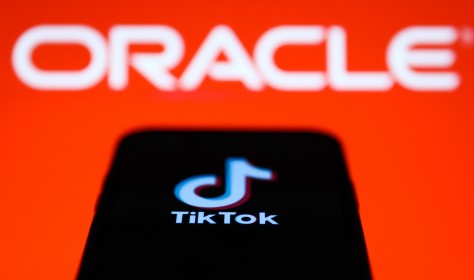 Logos of TikTok and Oracle