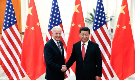 Chinese President Xi Jinping  shakes hands with US Vice President Joe Biden inside the Great Hall of the People in Beijing, China, 2013.