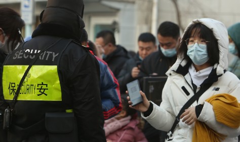 Chinese Show Security Health Status on Smarphone App in Beijing, China