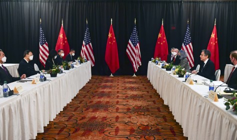 Secretary of State Antony Blinken, second from right, joined by national security adviser Jake Sullivan, right, speaks during the opening session of US-China talks with Chinese Communist Party foreign affairs chief Yang Jiechi, and China's State Councilor Wang Yi, at the Captain Cook Hotel in Anchorage, Alaska.