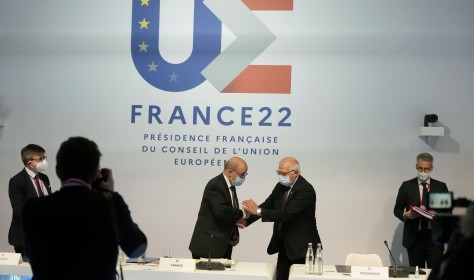 European Union foreign policy chief Josep Borrell, center right, greets French Foreign Minister Jean-Yves Le Drian prior to a meeting of European Union foreign ministers in Brest, France, Friday, Jan. 14, 2022.