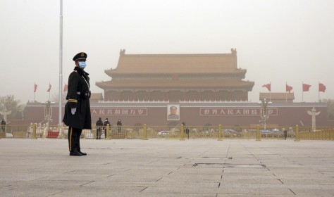 Police officers are seen at Tiananmen Square in Beijing