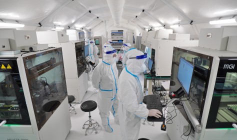 Staff members install and debug equipment at the Huo-Yan laboratory in Yantai, East China's Shandong Province