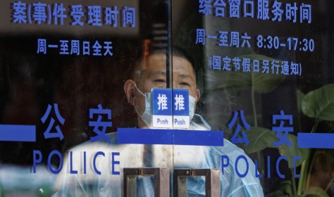 A man stands in police station, in Shanghai, China, 06 July 2022.