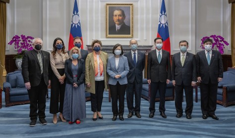 In this photo released by the Taiwan Presidential Office, Taiwan's President Tsai Ing-wen, center right, pose for photos with European Parliament Vice President Nicola Beer, center left, and her delegation at the Presidential Office in Taipei, Taiwan on Wednesday, July 20, 2022.