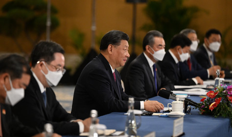 China's President Xi Jinping (C) attends a meeting on the sidelines of the G20 Leaders' Summit in Bali, Indonesia, 15 November 2022.