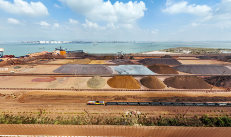 A train pulls into Dongwu port District to carry an inbound iron ore unloaded by a foreign ship in Putian, Fujian province, China, Sept 29, 2022