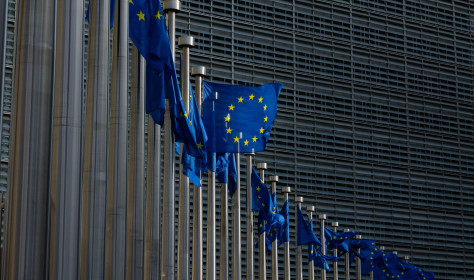 European flags in front of the European Commission headquarters in Brussels.